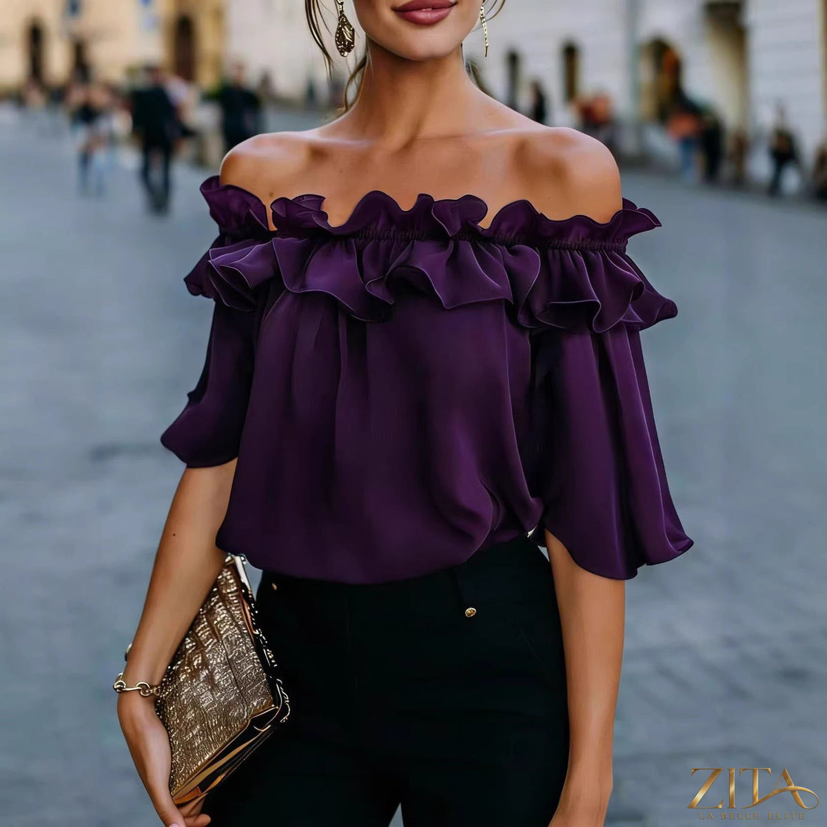 Women's loose-fit short-sleeve minimalist casual shirt by Zita La Belle Elite, shown in a relaxed fit with clean lines and soft fabric.