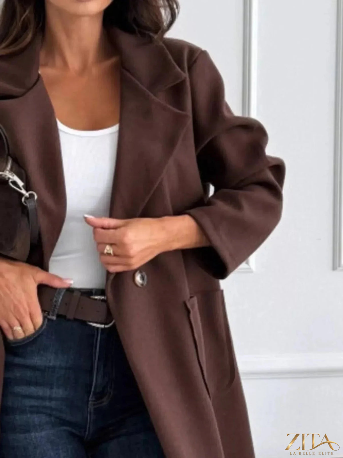 Zita La Belle Elite long-sleeve single-breasted trench coat in classic beige, shown on a model with a belt and collar detailing.