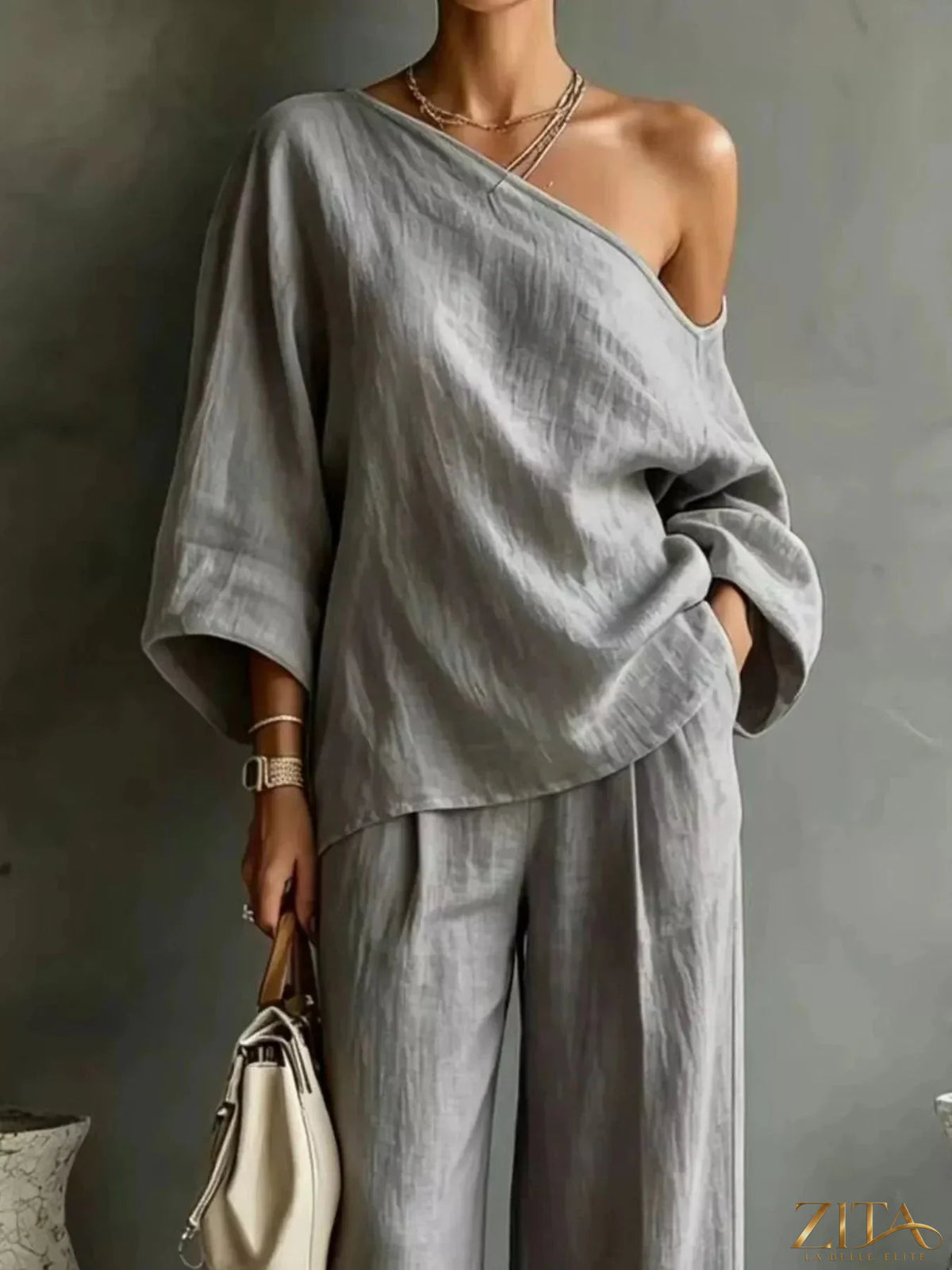 Zita La Belle Elite one-shoulder top and wide-leg pants set, stylish fashion outfit with a modern, elegant look.