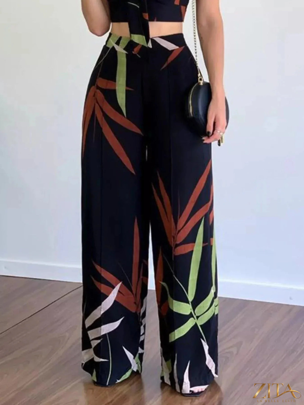 Zita La Belle Elite tropical print spaghetti strap crop top and wide-leg pants set displayed on a model.