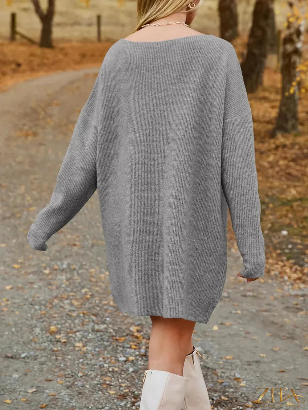 Zita La Belle Elite V-neck dropped shoulder sweater dress in soft knit fabric, featuring a relaxed fit and long sleeves.