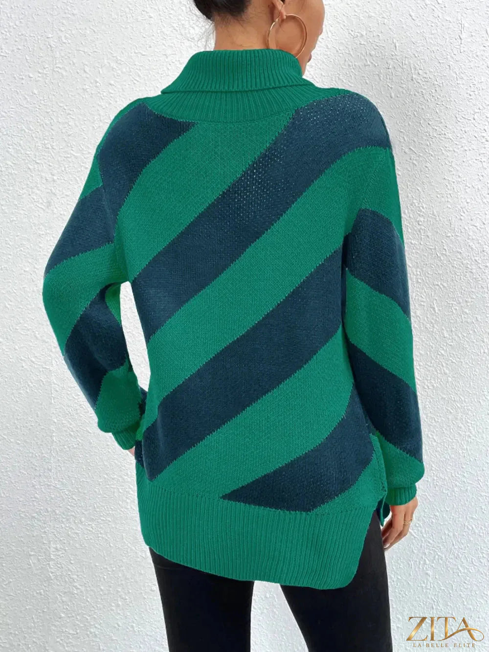 Striped turtleneck dropped shoulder sweater by Trendsi, featuring a cozy knit design with bold stripe patterns and relaxed fit.