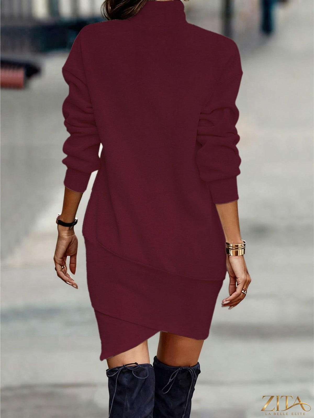 Black turtleneck long sleeve mini dress with asymmetrical hem by Trendsi, featuring a fitted silhouette and stylish design.