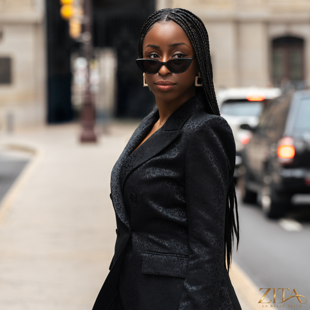 Zita La Belle Elite PREMIER black blazer, tailored fit, with classic lapels and sleek design, on a hanger.