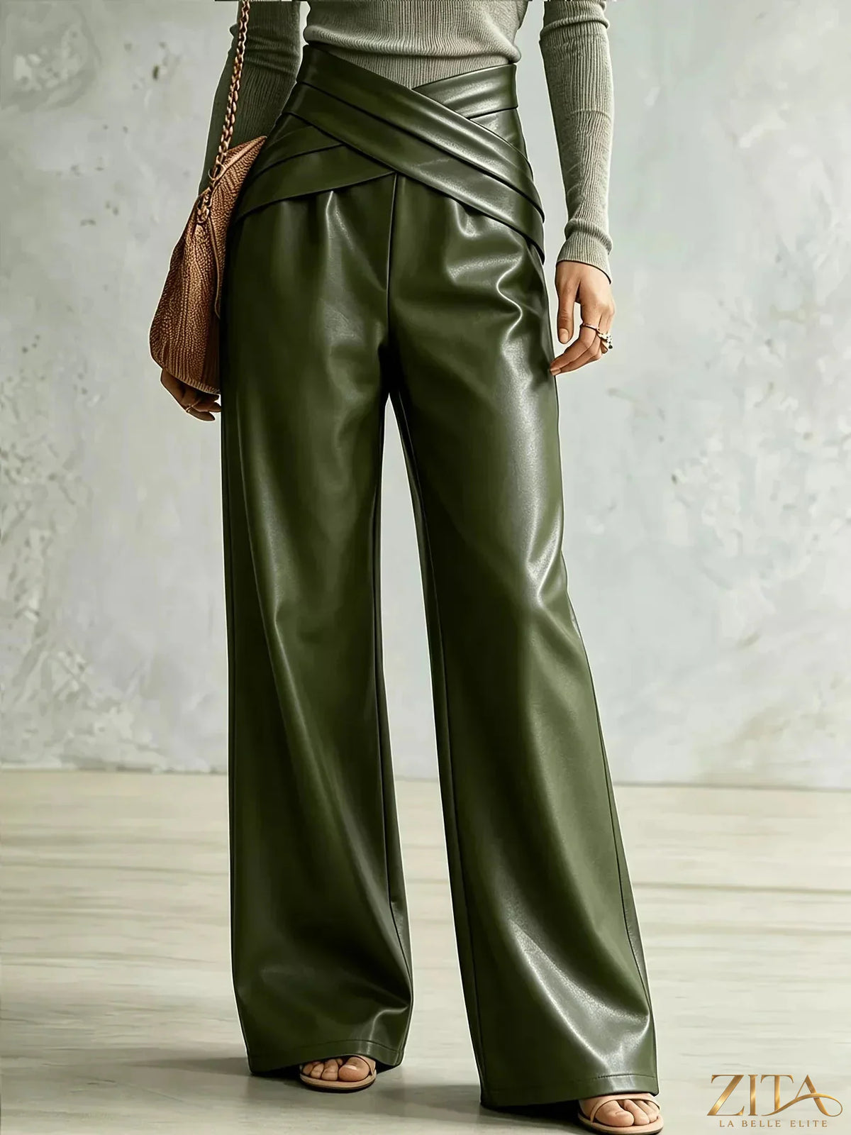 Zita La Belle Elite criss-cross wide leg pants in black fabric, featuring a high waist and flowing, relaxed fit.