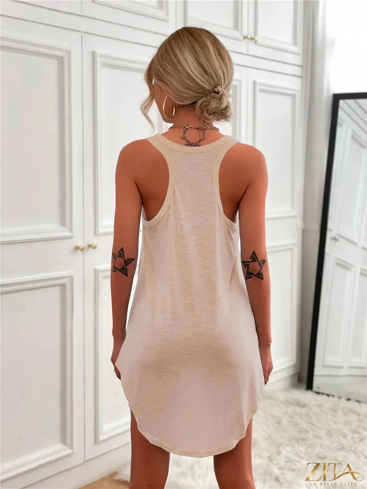 Zita La Belle Elite casual tank mini dress with curved hem, sleeveless design, lightweight fabric, and relaxed fit.