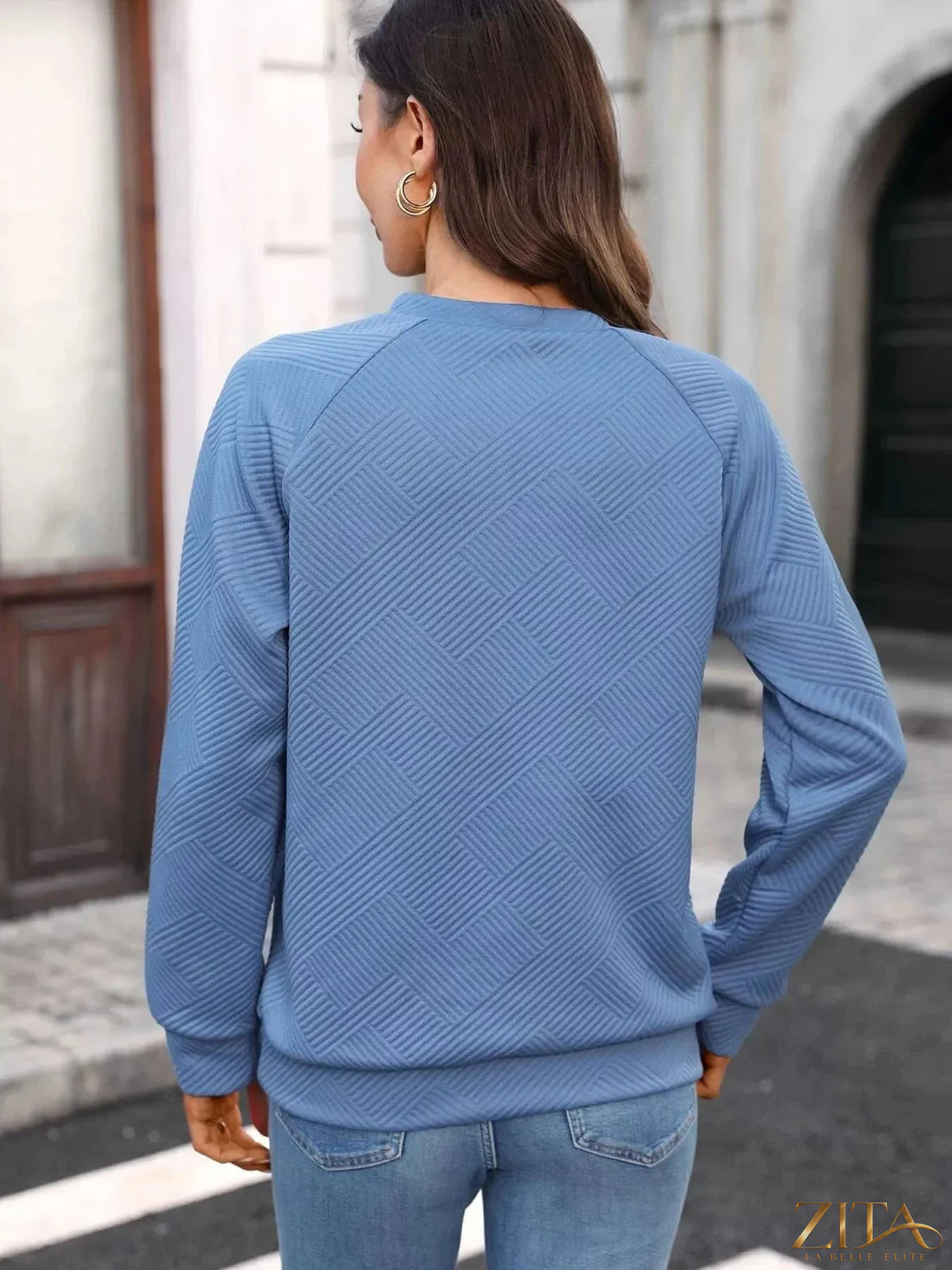 Textured notched long sleeve sweatshirt by Zita La Belle Elite, featuring a stylish design and comfortable fit.