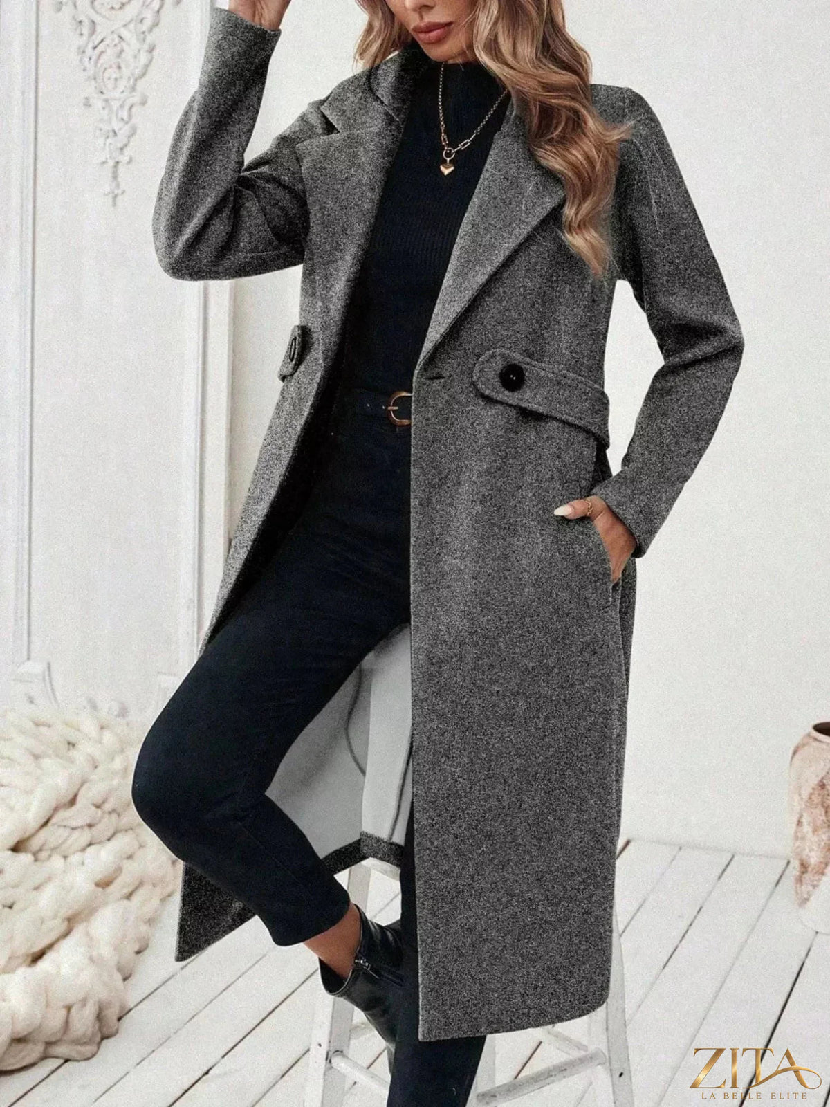 Zita La Belle Elite longline coat with lapel collar, lightweight fabric, and tailored fit, shown on a model.