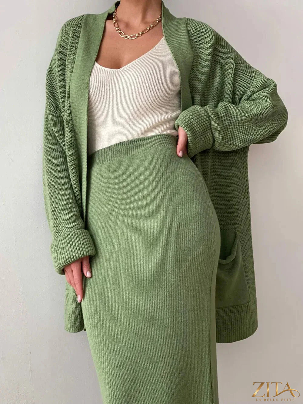 Zita La Belle Elite pocketed long sleeve cardigan and skirt sweater set, featuring a coordinated knit design and soft fabric.