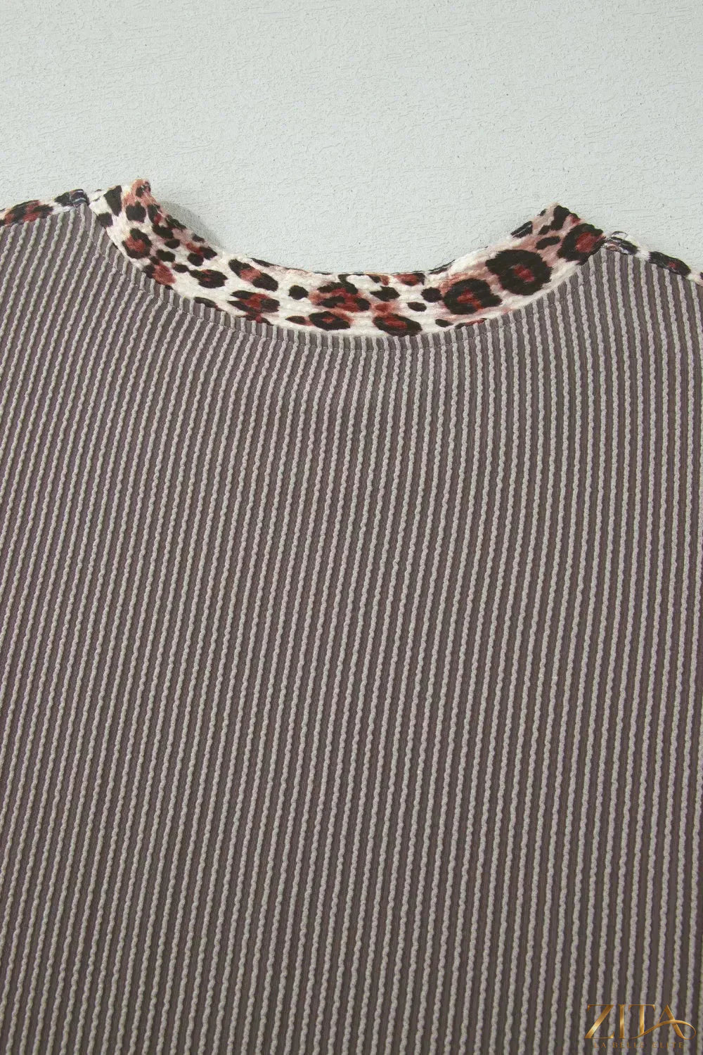 Leopard trim ribbed knit two-piece set for women featuring a fitted tee and matching shorts by Trendsi.