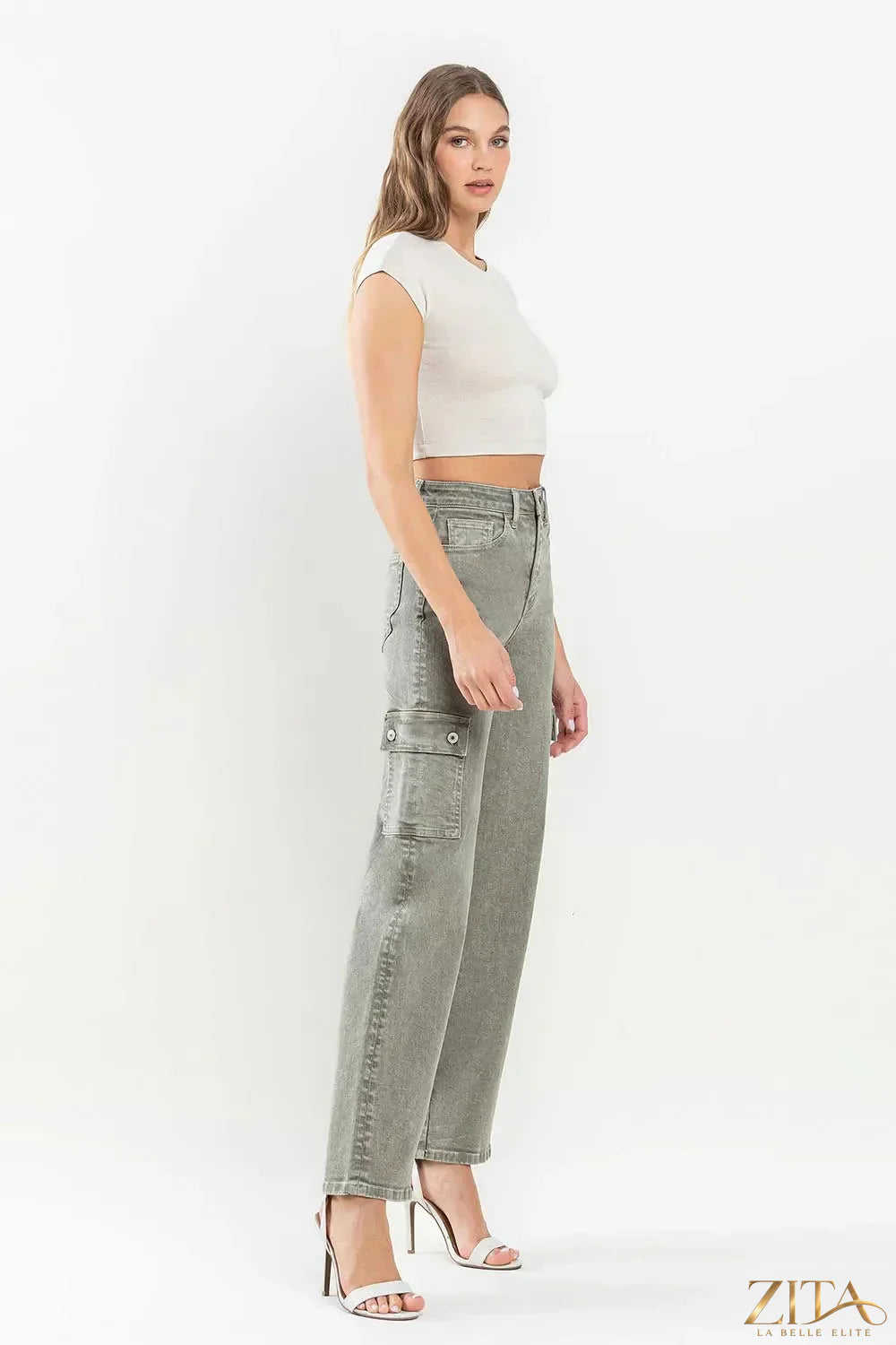 Vervet by Flying Monkey 90's super high rise cargo jeans in light denim with multiple pockets and relaxed fit.