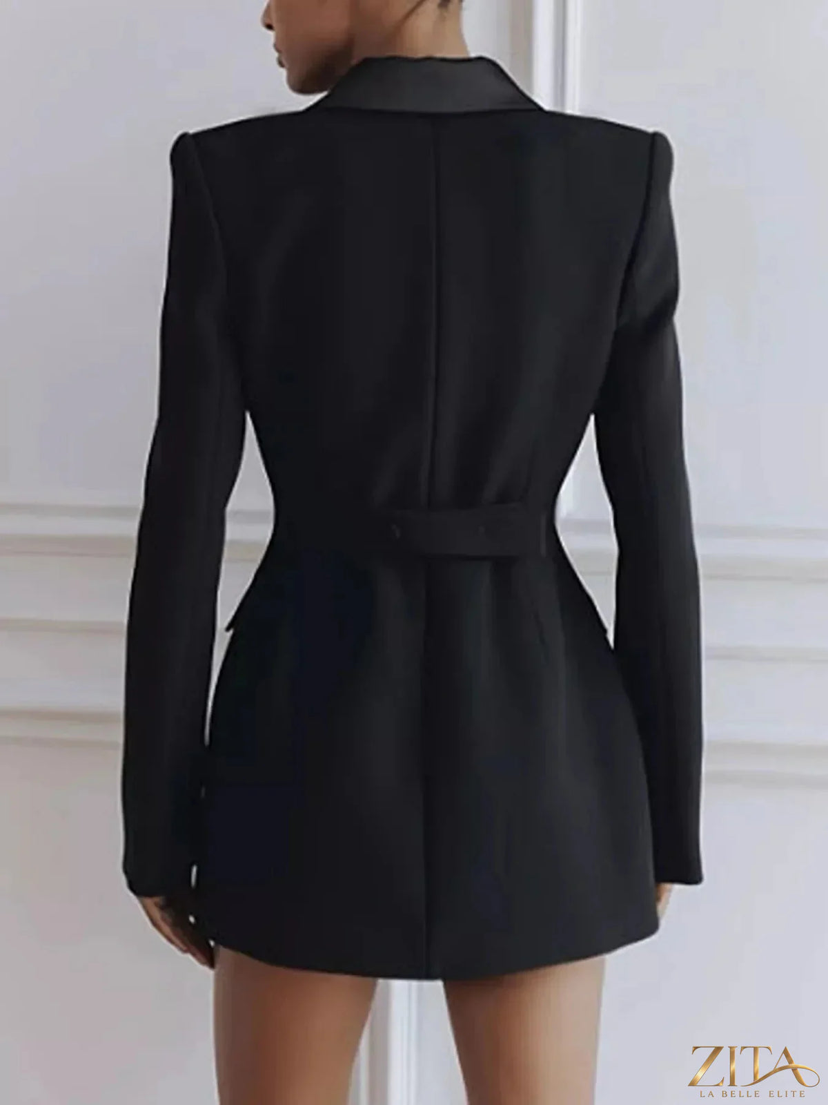 Zita La Belle Elite satin lapel double-breasted blazer displayed on a hanger, showcasing sleek fabric and tailored fit.
