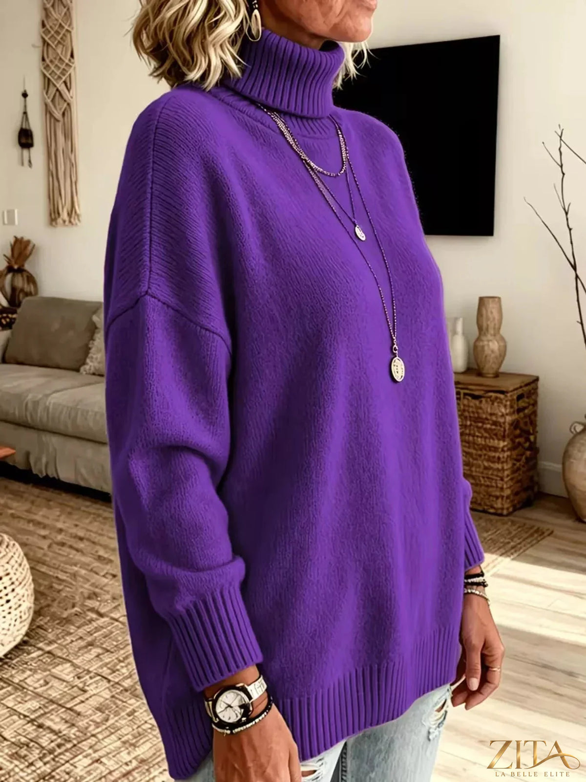 Zita La Belle Elite turtleneck dropped shoulder sweater in soft fabric, shown in a stylish close-up view.