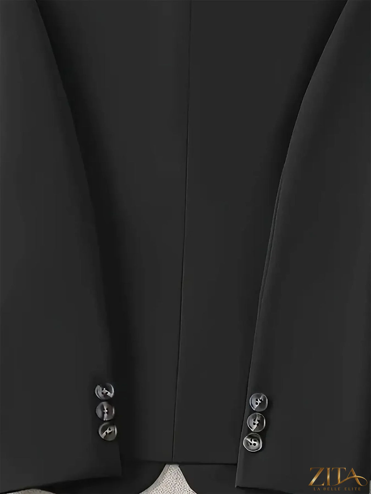 Black one-button blazer with front pockets from Trendsi, featuring a tailored fit and stylish design for professional or casual wear.