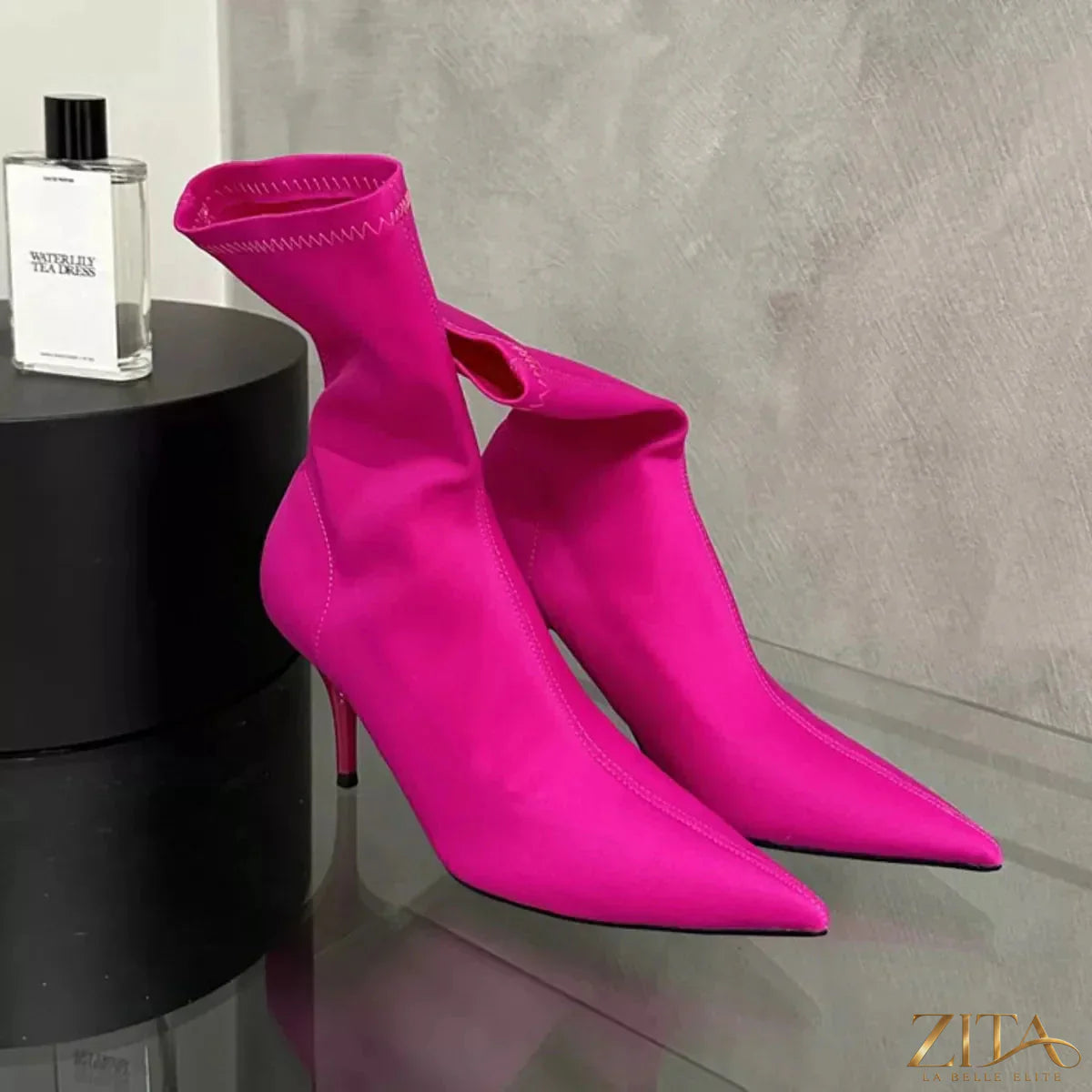 Zita La Belle Elite point toe mid heel boots in black leather, stylish footwear with sleek design and comfortable heel height.