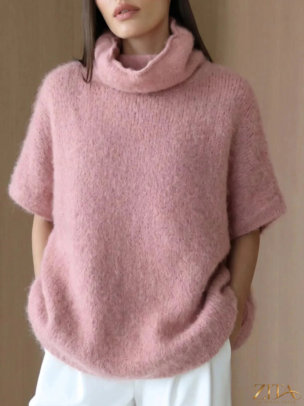 Zita La Belle Elite fuzzy short sleeve turtleneck sweater in cozy, textured fabric, shown in a close-up view.