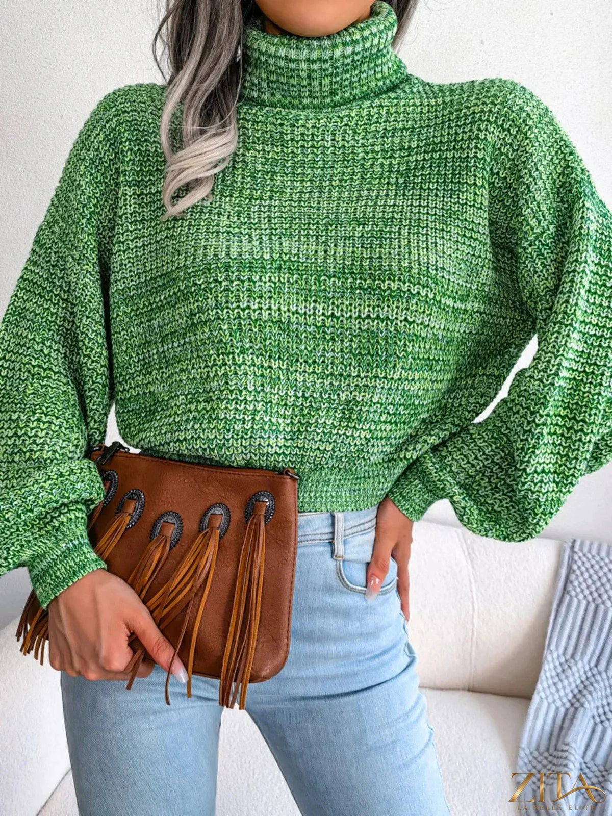 Light gray turtleneck dropped shoulder sweater by Trendsi, showcasing a cozy knit fabric and relaxed fit.