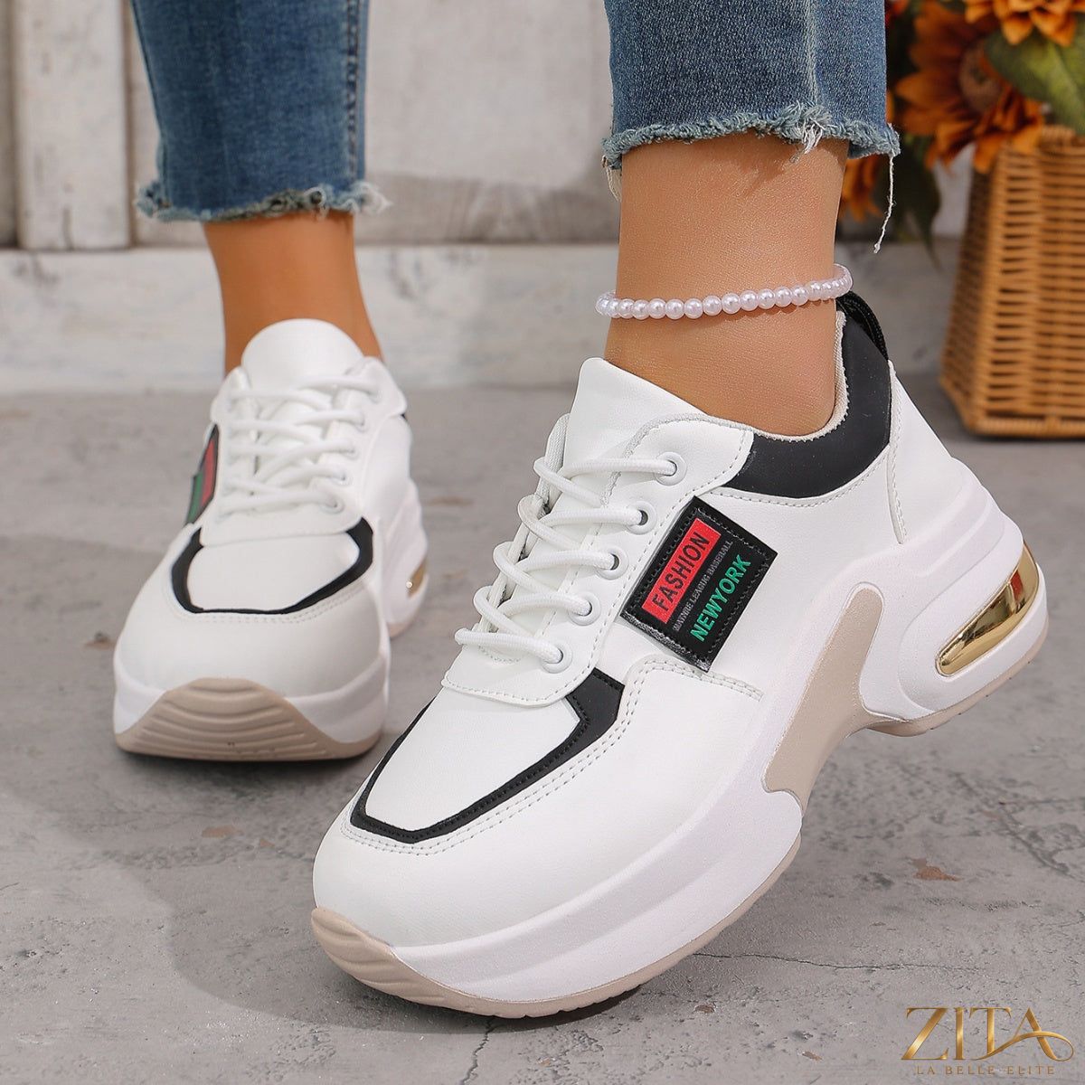 Zita La Belle Elite round toe lace-up sneakers featuring white leather and rubber soles, casual athletic shoe design.