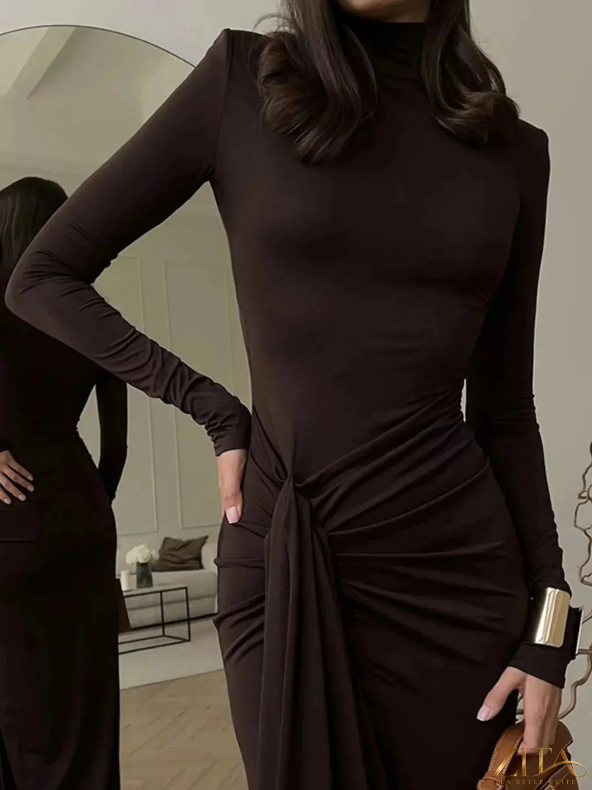Long sleeve turtleneck maxi dress with side slit, stylish design by Trendsi, shown in a full-length view.