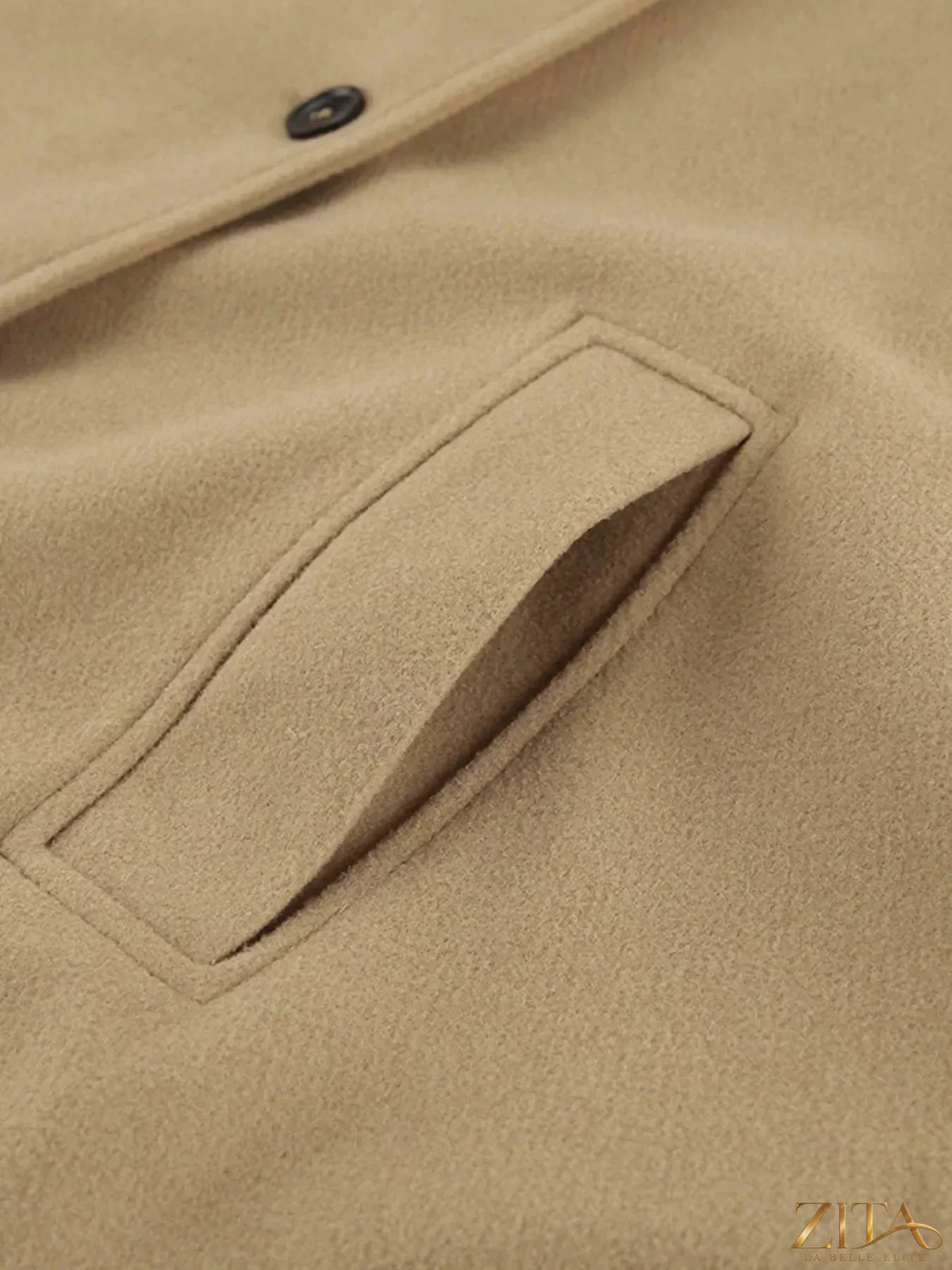 Zita La Belle Elite oversized lapel collar button-down coat in neutral fabric, displayed on a hanger.