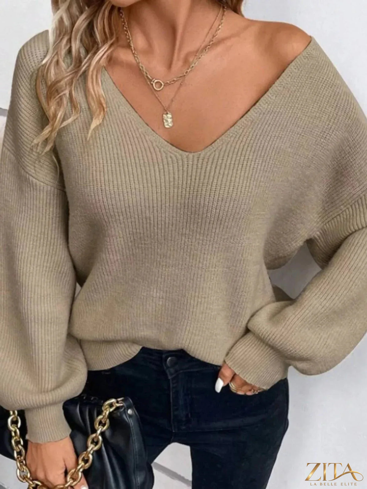 Zita La Belle Elite back bow V-neck sweater in soft knit fabric, featuring a stylish bow detail at the back.