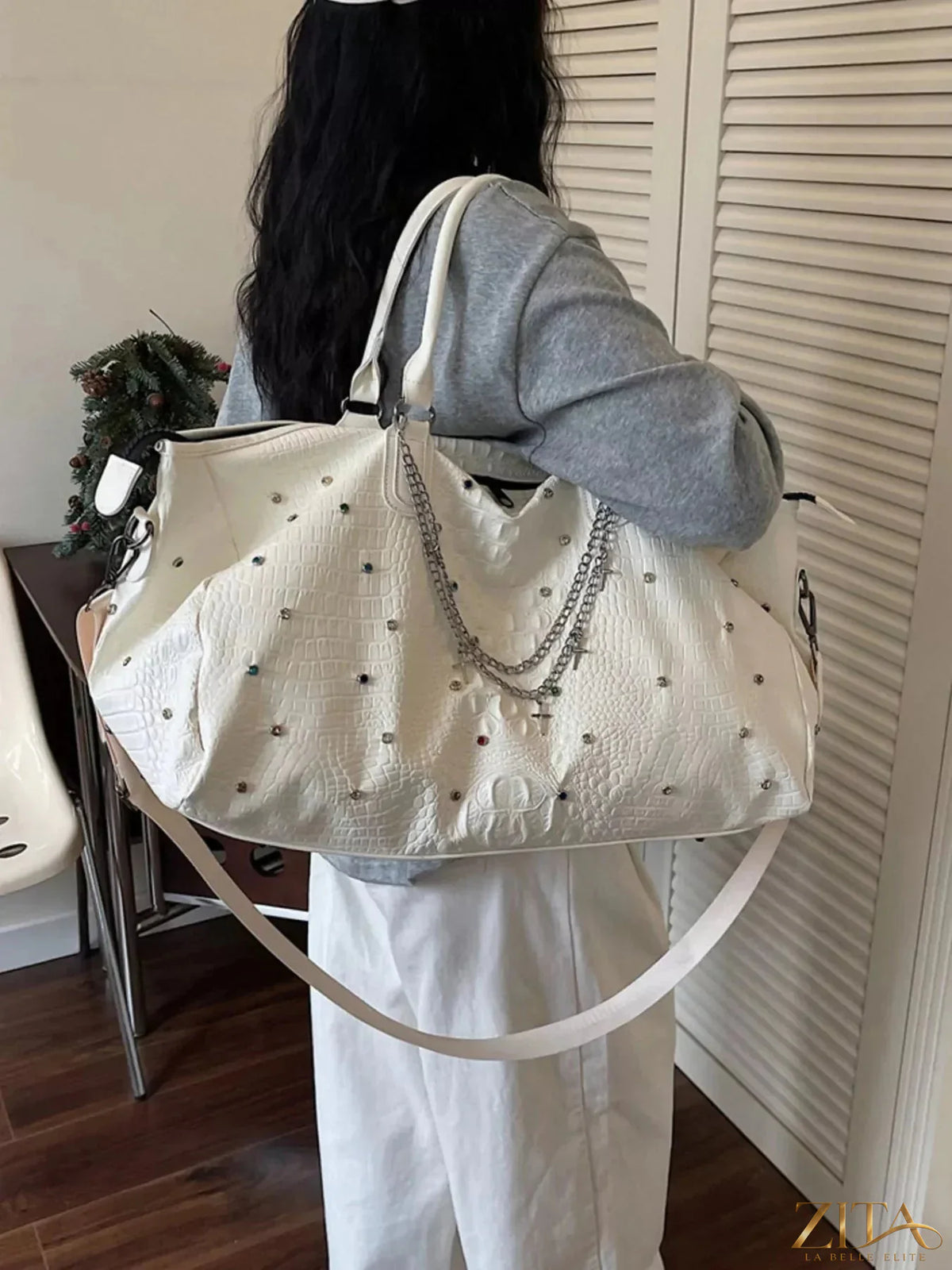 Zita La Belle Elite studded large capacity travel bag with multiple compartments and sturdy handles, ideal for long trips.