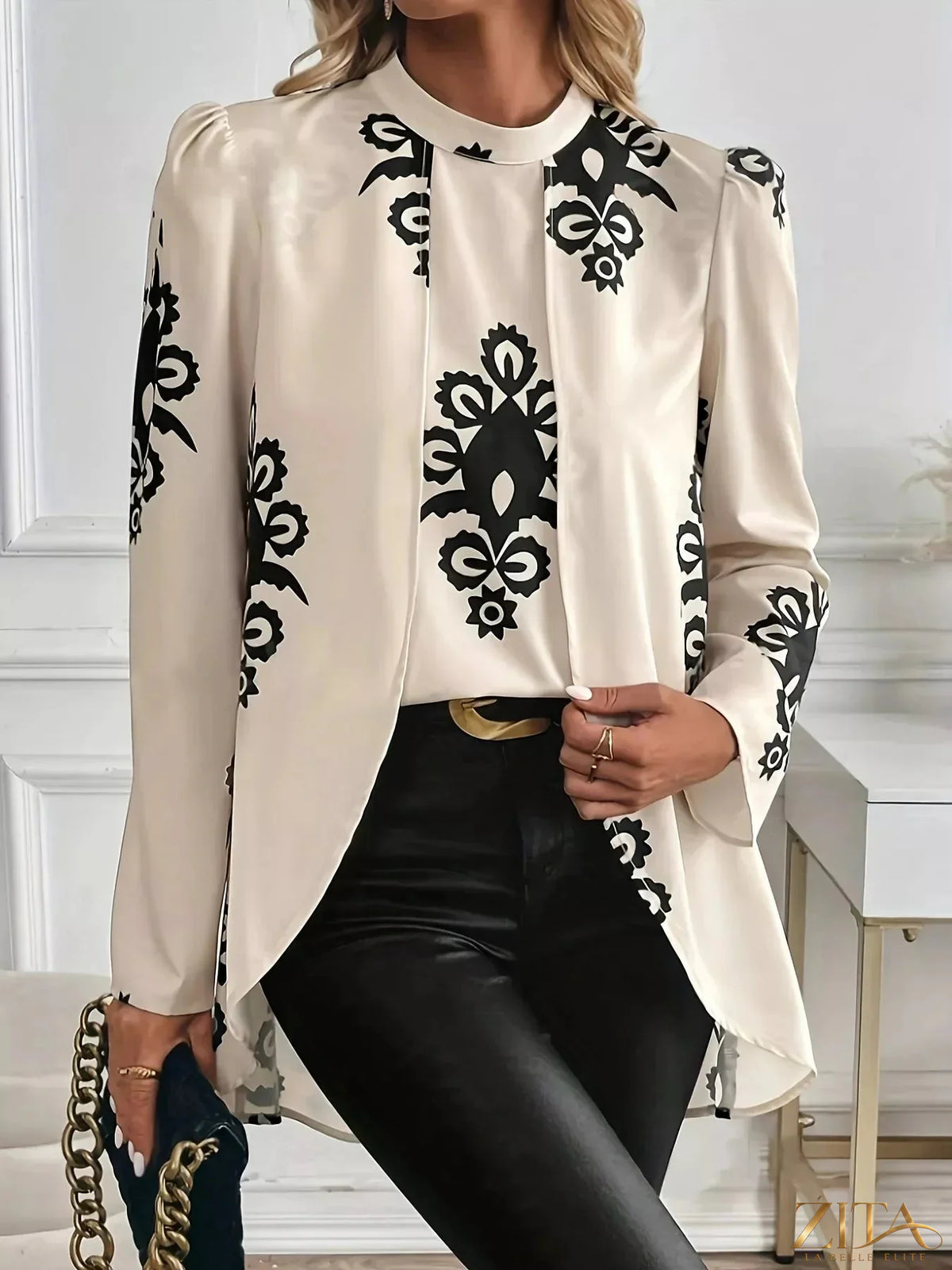 Zita La Belle Elite printed long sleeve blouse featuring floral pattern, lightweight fabric, and classic collar on a model.