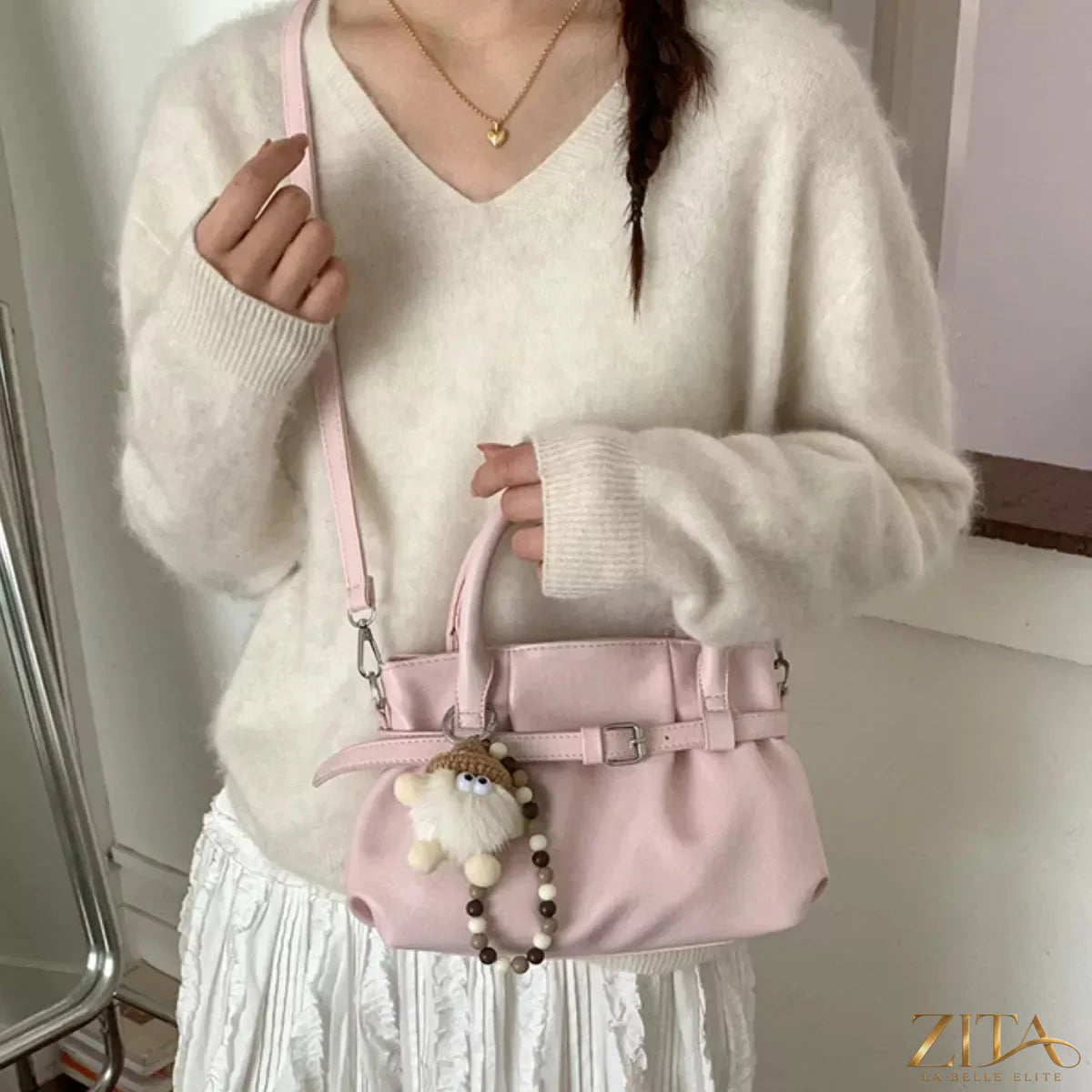 Trendsi PU leather handbag featuring a sleek design with top handles and a spacious interior, perfect for stylish everyday use.