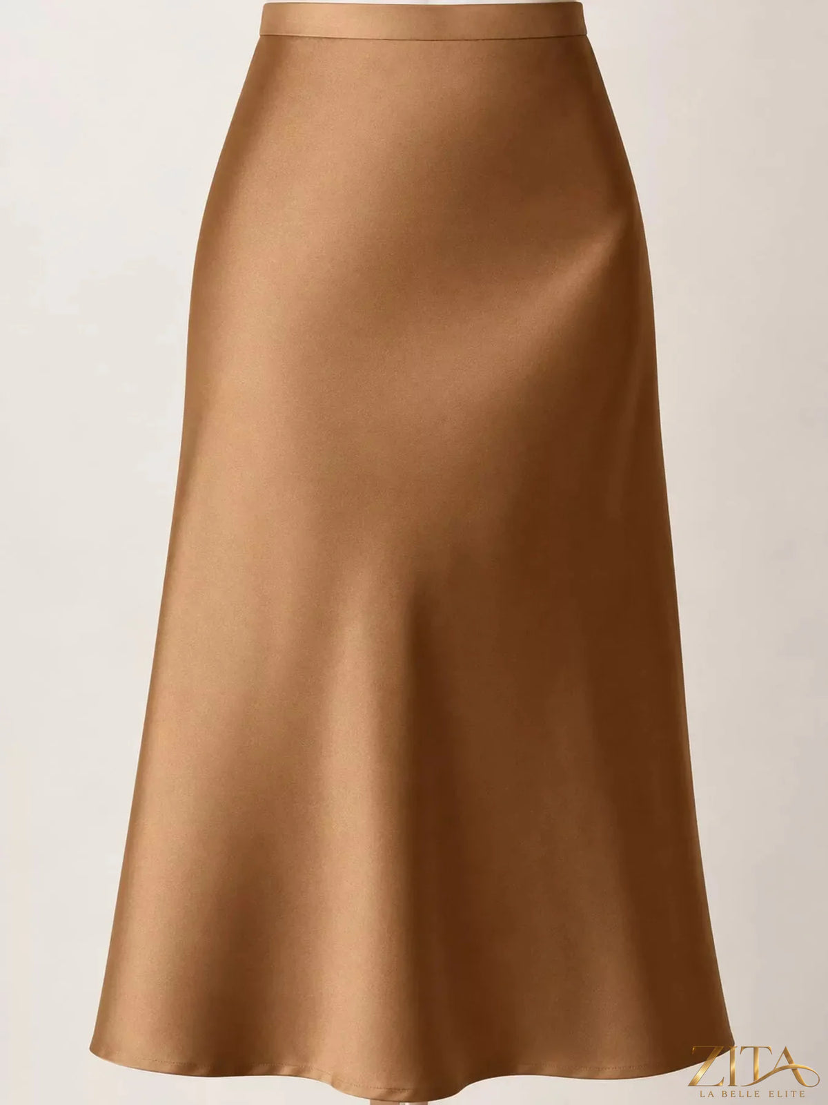 High-waisted satin midi skirt from Trendsi, featuring a smooth, shiny fabric and a sleek, elegant design.