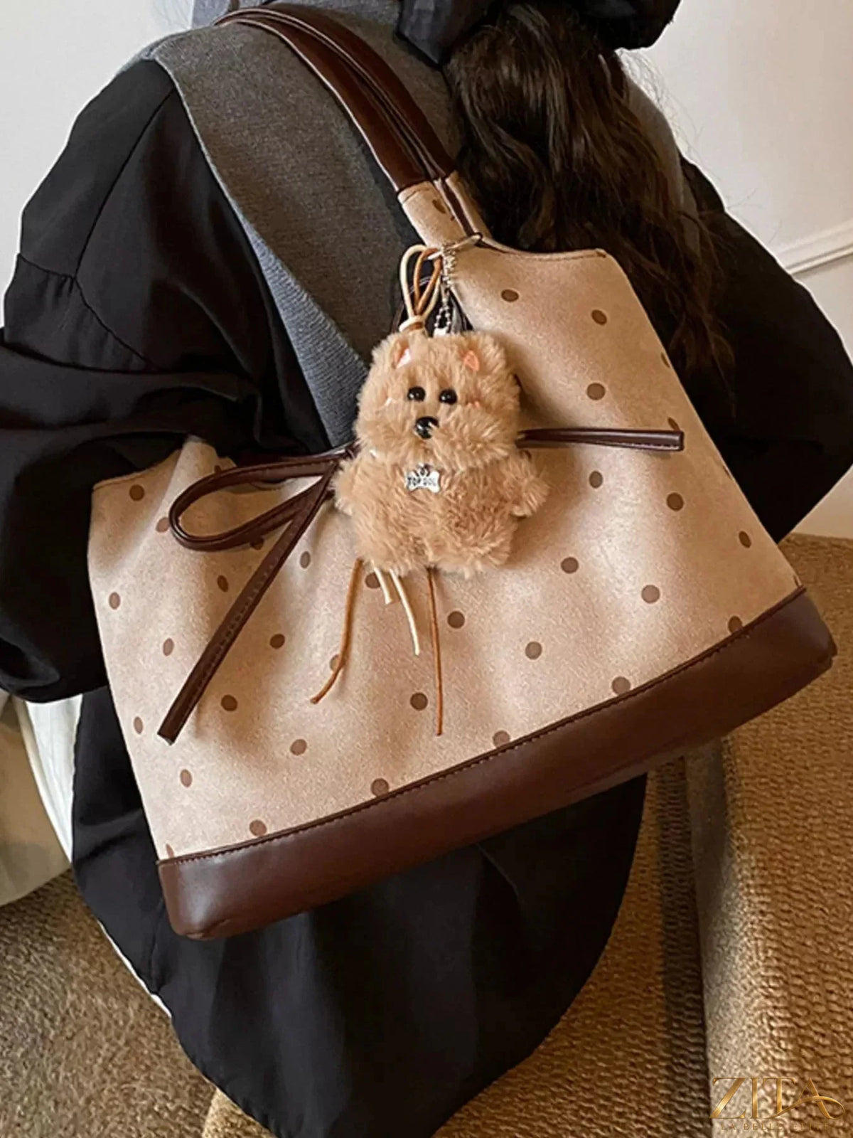 Zita La Belle Elite polka dot bow shoulder bag with adjustable strap and stylish design, perfect for casual or dressy outfits.