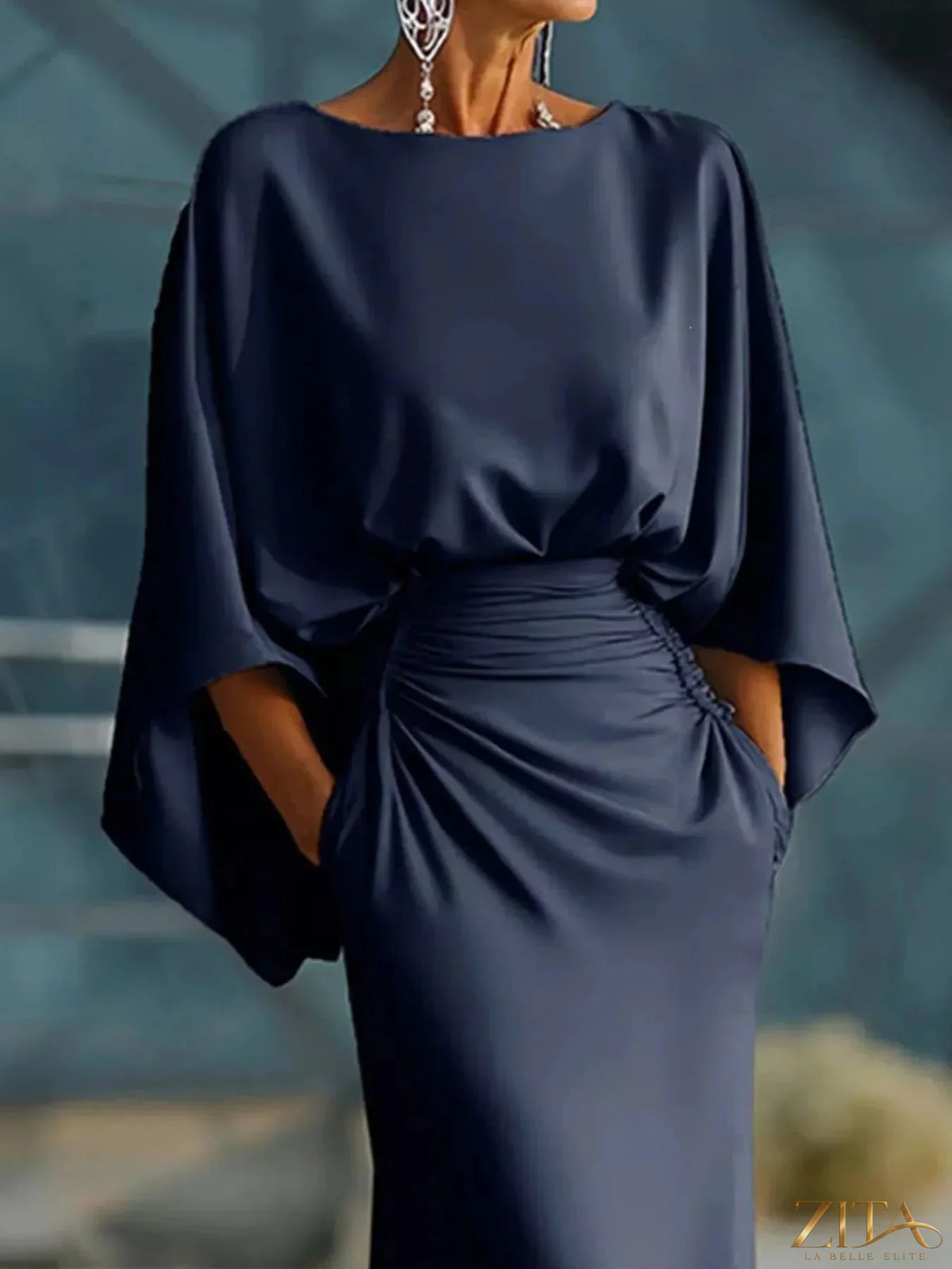 Zita La Belle Elite batwing sleeve ruched maxi dress in flowing fabric, featuring a fitted waist and elegant design.