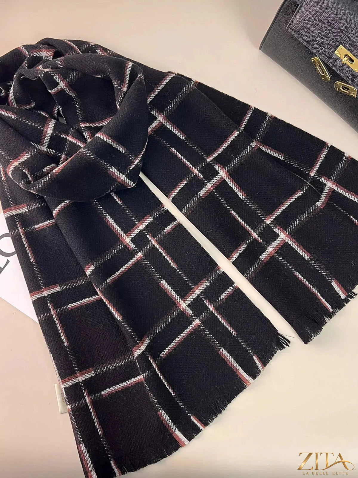 Zita La Belle Elite 100% wool raw hem plaid scarf in red and black with fringed edges, cozy and stylish accessory for cold weather.