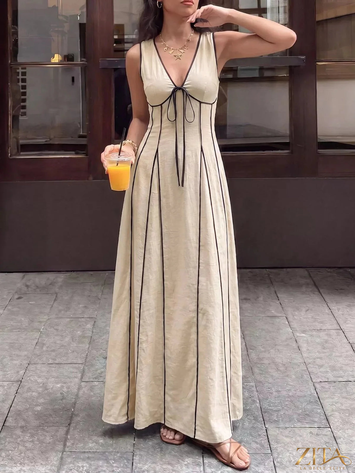 Zita La Belle Elite sleeveless V-neck maxi dress with flowing fabric and elegant style, perfect for formal or summer occasions.