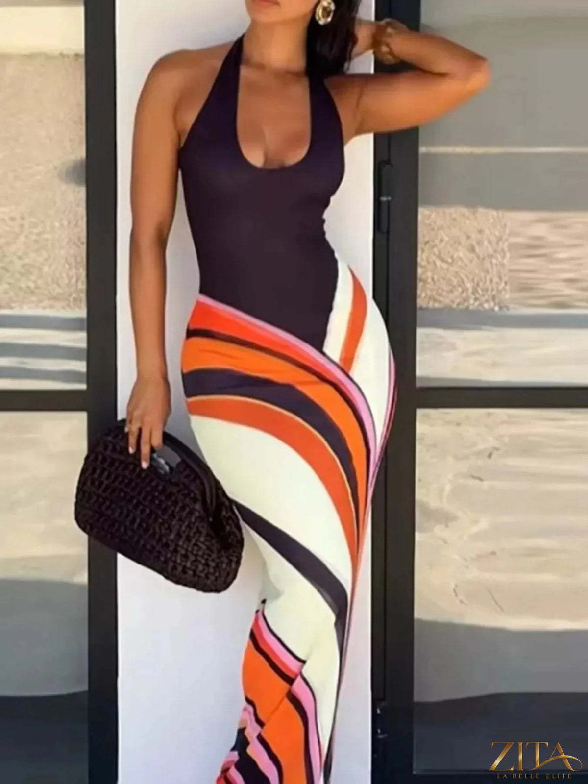 Zita La Belle Elite halter neck maxi dress with abstract print, flowing fabric and stylish design perfect for summer occasions.