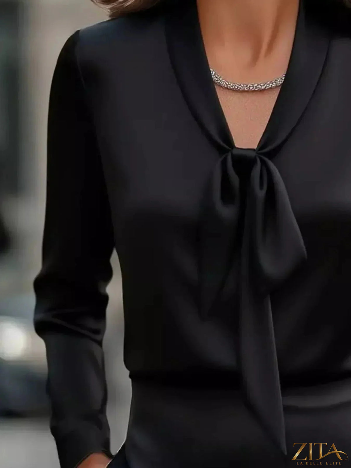 Satin tie-front long sleeve blouse by Zita La Belle Elite, featuring a stylish front tie and elegant long sleeves.