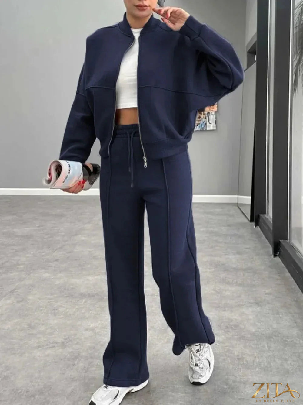 Zita La Belle Elite baseball collar zip-up outerwear and drawstring pants set, featuring a stylish athletic design and comfortable fit.