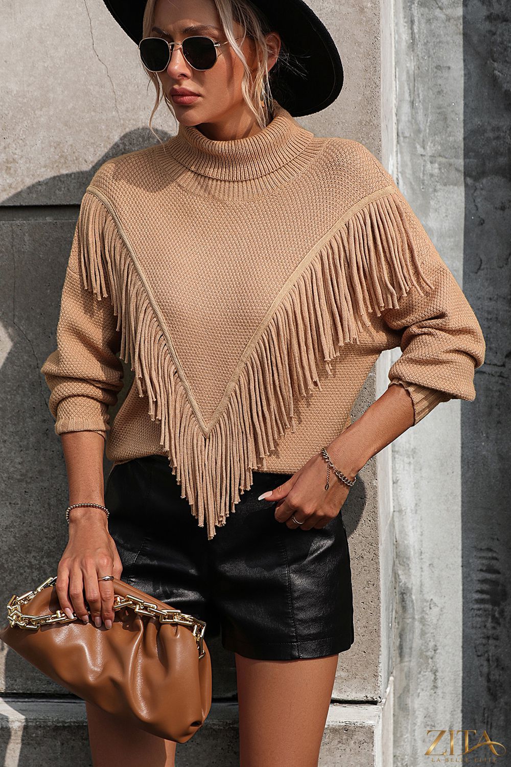 Turtle neck tassel front long sleeve pullover sweater by Trendsi, featuring a cozy design with tassels on the front and a ribbed texture.