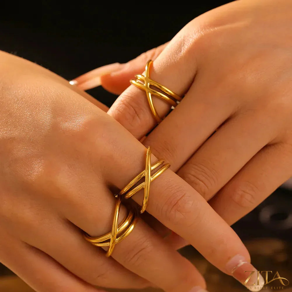 18K gold-plated crisscross ring with elegant band design from Zita La Belle Elite, showcasing shiny gold finish.