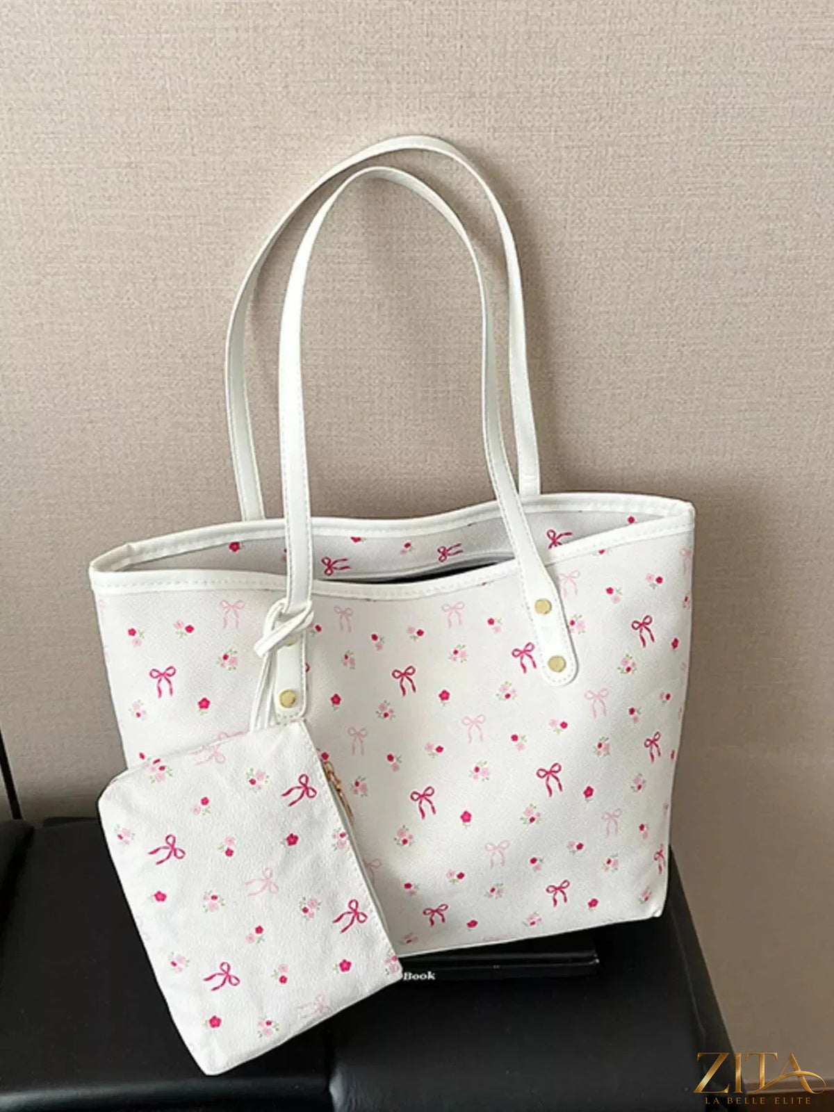 Printed tote shoulder bag with matching pouch by Zita La Belle Elite, featuring vibrant floral design and durable fabric.