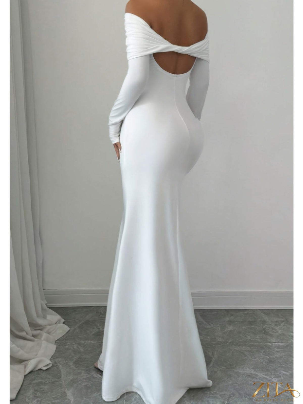 Elegant off-shoulder midi evening gown by Zita La Belle Elite, showcasing a stylish women’s evening dress with a flowing design.