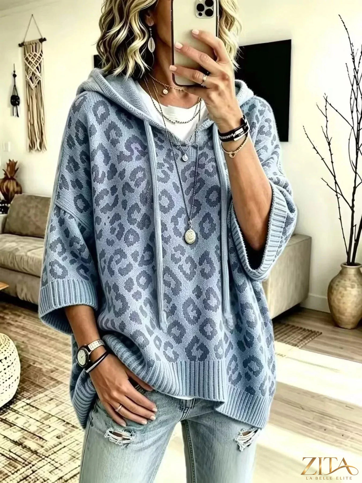 Zita La Belle Elite leopard print hooded sweater with drawstring, cozy knit fabric, and relaxed fit.
