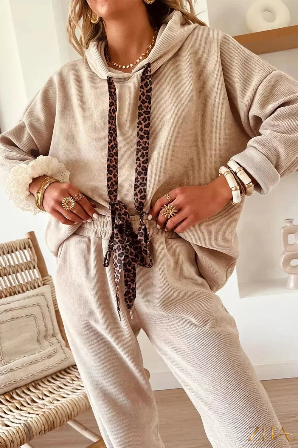 Zita La Belle Elite leopard print drawstring hoodie and pants set, two-piece casual outfit with bold animal pattern and comfortable fit.