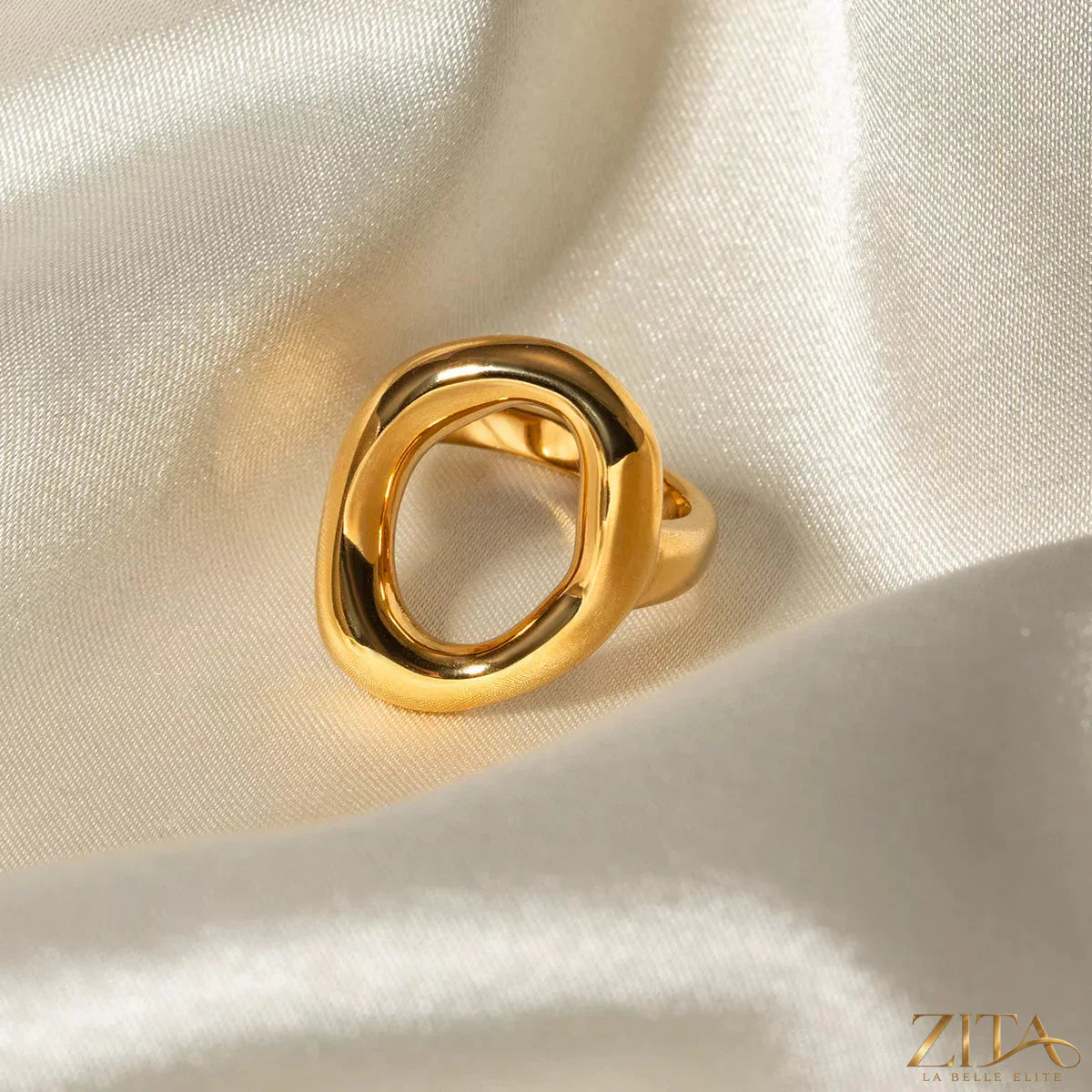 Elegant modern hollow oval ring by Zita La Belle Elite featuring a sleek gold band and minimalist design.