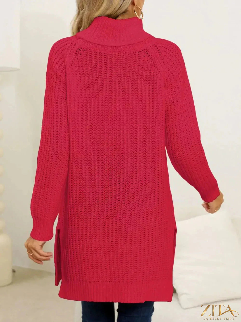 Trendsi slit turtleneck long sleeve sweater featuring a fitted silhouette and a stylish side slit, in a cozy knit fabric.