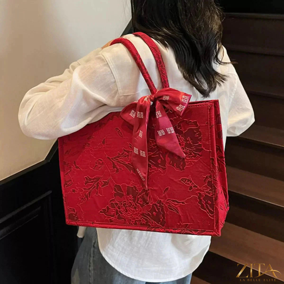 Zita La Belle Elite floral embossed tote handbag with scarf accent, showing textured floral design and elegant accessory details.
