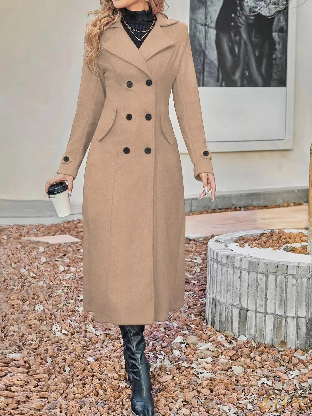 Zita La Belle Elite double-breasted longline coat in dark fabric, featuring wide lapels and a tailored fit for a sophisticated look.