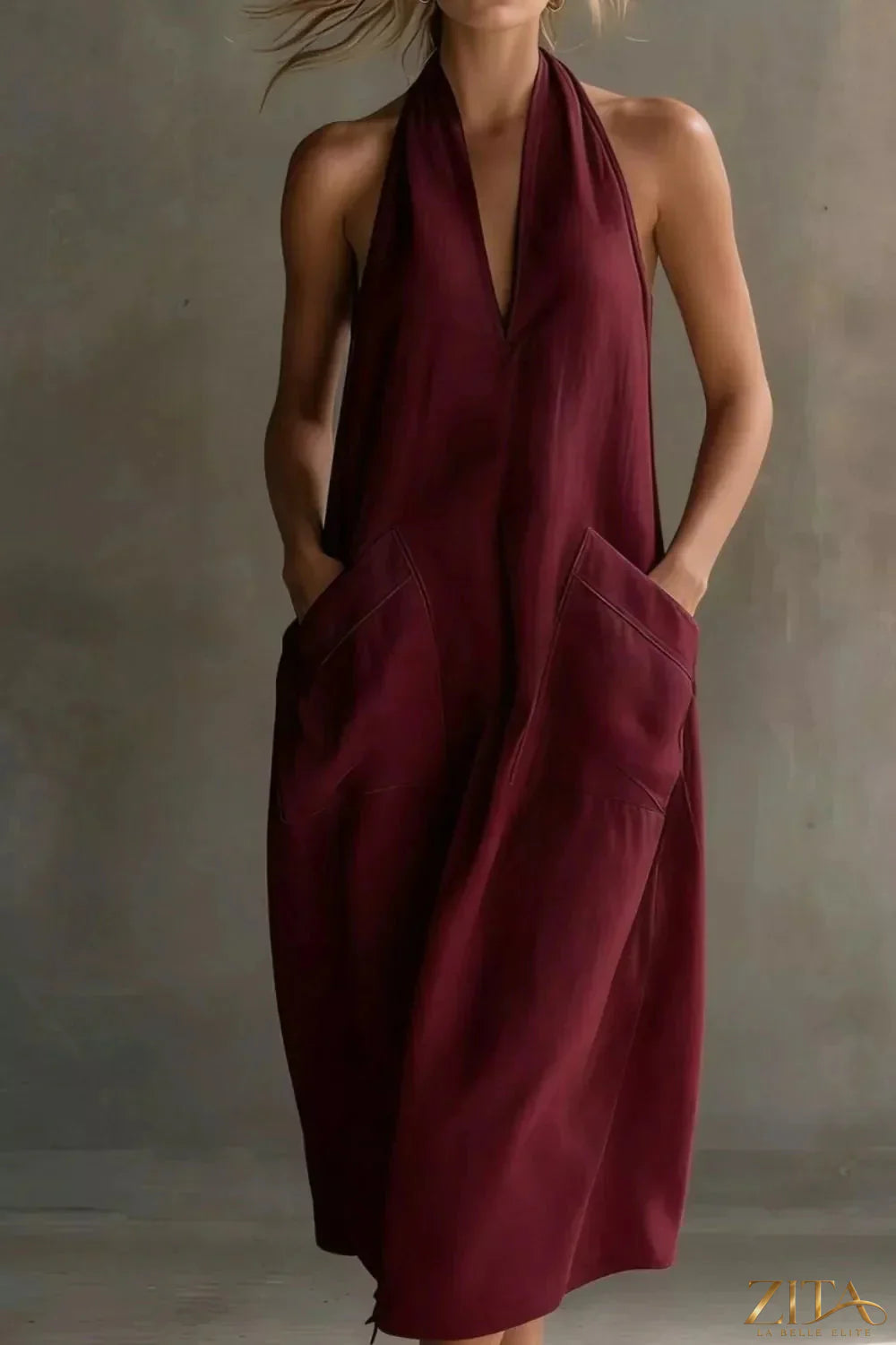 Zita La Belle Elite casual halter neck midi dress with front pockets, sleeveless design, and relaxed fit.
