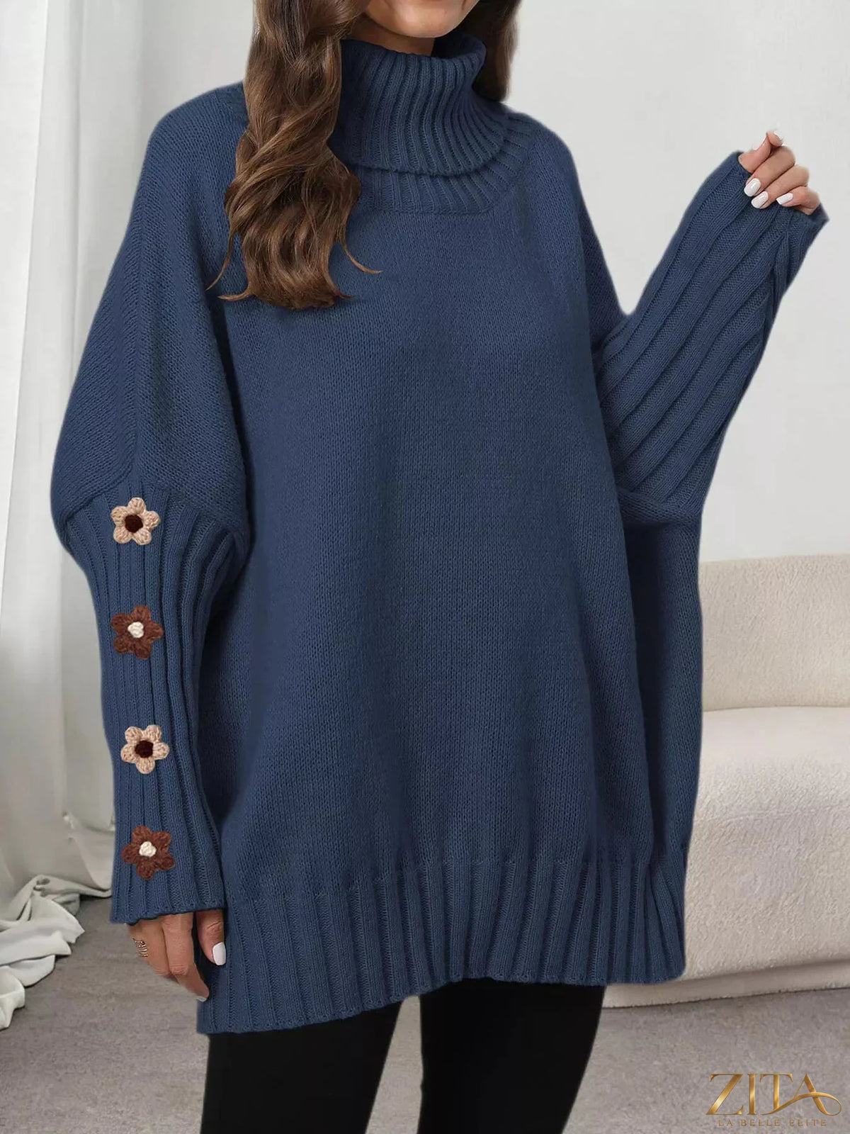 Zita La Belle Elite oversized turtleneck sweater with floral applique sleeves in soft knit fabric, stylish and cozy for fall.