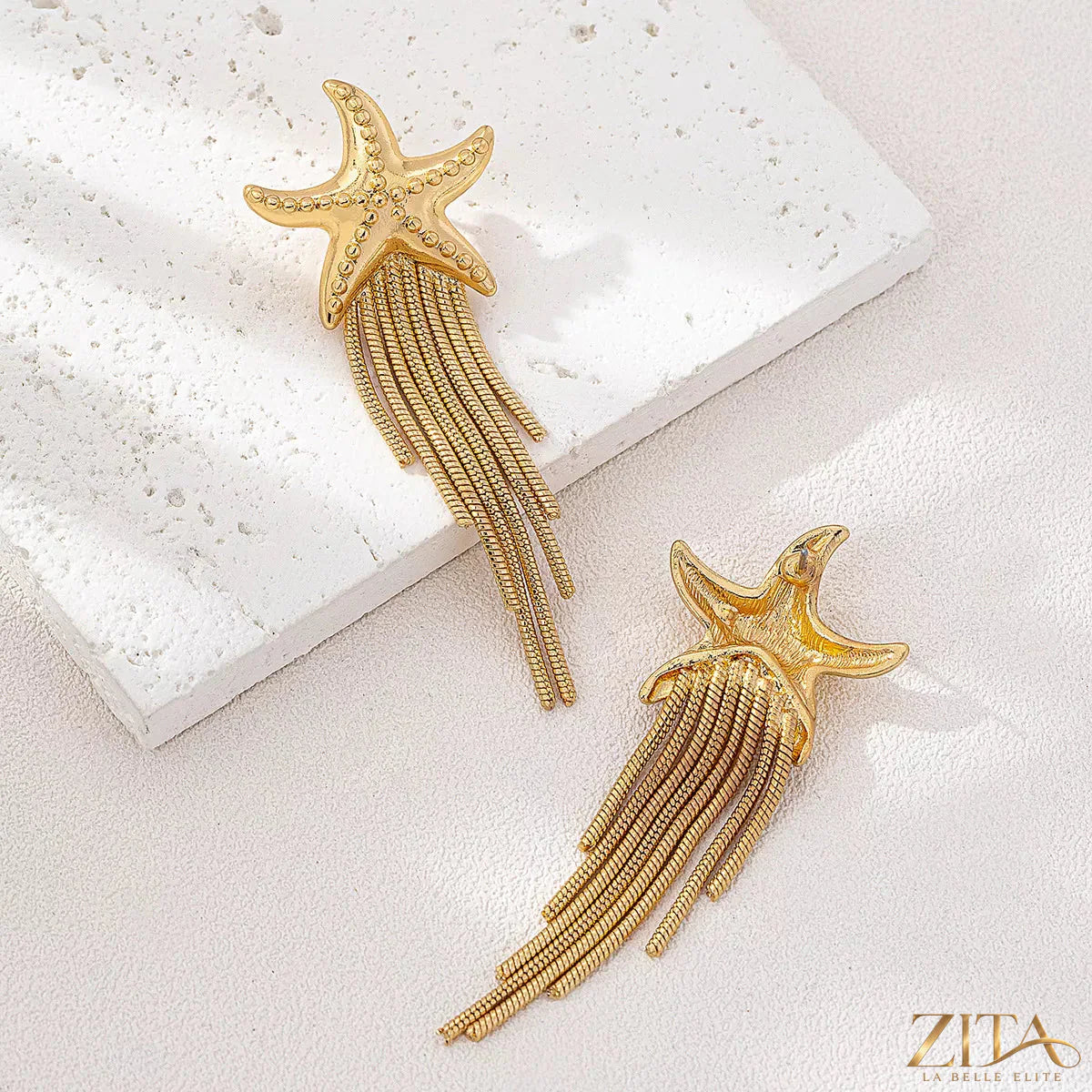 18K gold-plated starfish fringe drop earrings with delicate design, featuring sparkling accents and a stylish, ocean-inspired look.