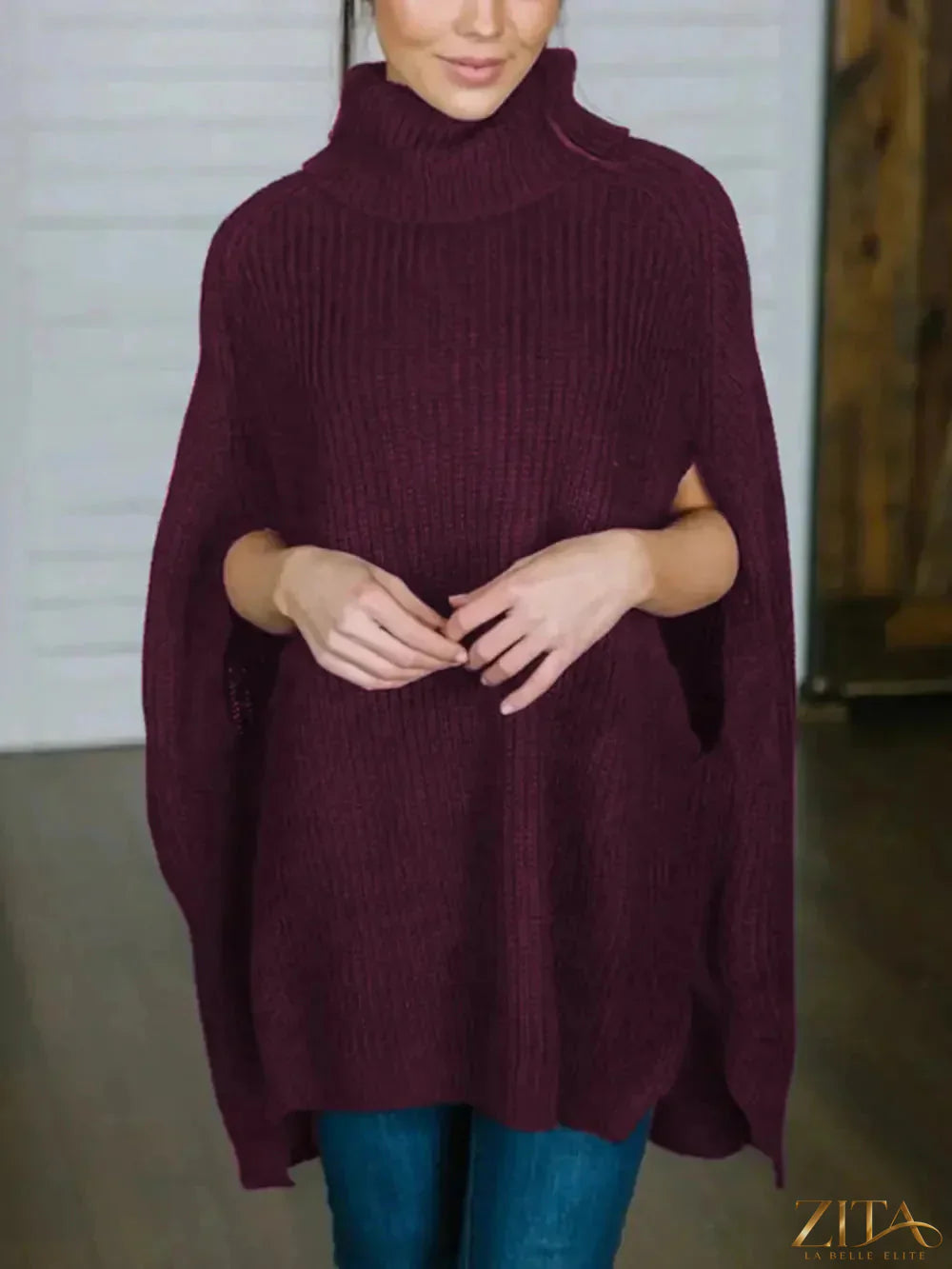 Zita La Belle Elite turtleneck slit sweater in soft knit fabric, featuring a stylish slit design and fitted silhouette.
